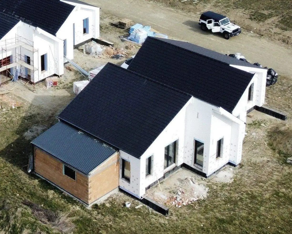 Modernes Architektur-Highlight: Energieeffizientes Einfamilienhaus mit intelligenter Gebäudeanbindung und harmonischer Dachgestaltung, 11/11. kép